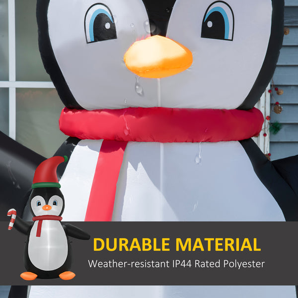 Pingouin gonflable tenant une canne à sucre de 2,4 mètres