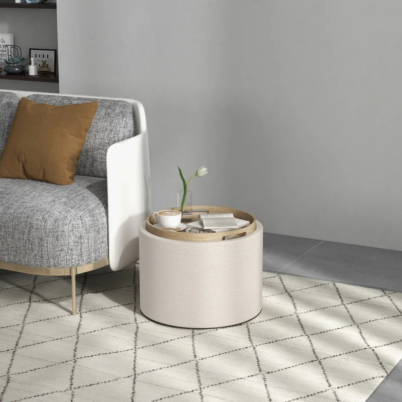 Table basse ronde avec rangement dissimulé et plateau rembourré en lin