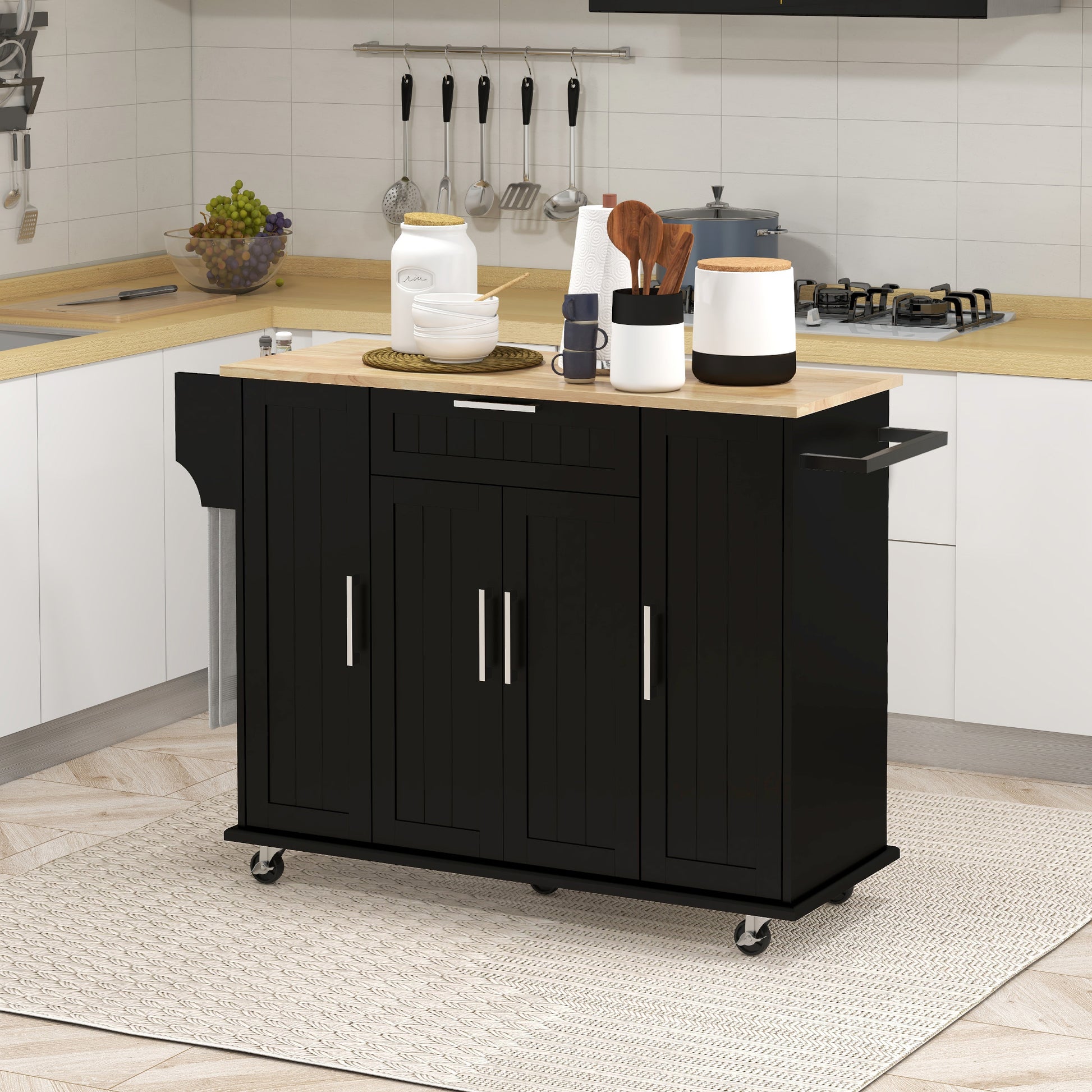 Desserte de cuisine moderne noire avec roulettes, tiroirs de rangement, plateau en bois naturel et porte-serviettes intégré, idéale pour optimiser l’espace dans une cuisine contemporaine