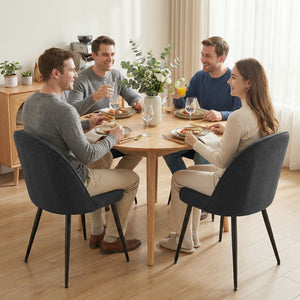 Set of 4 modern dining chairs with metal legs, shell back, and upholstered seat, black.