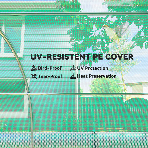 Heated tunnel greenhouse for plants with shade netting and roll-up mesh side walls