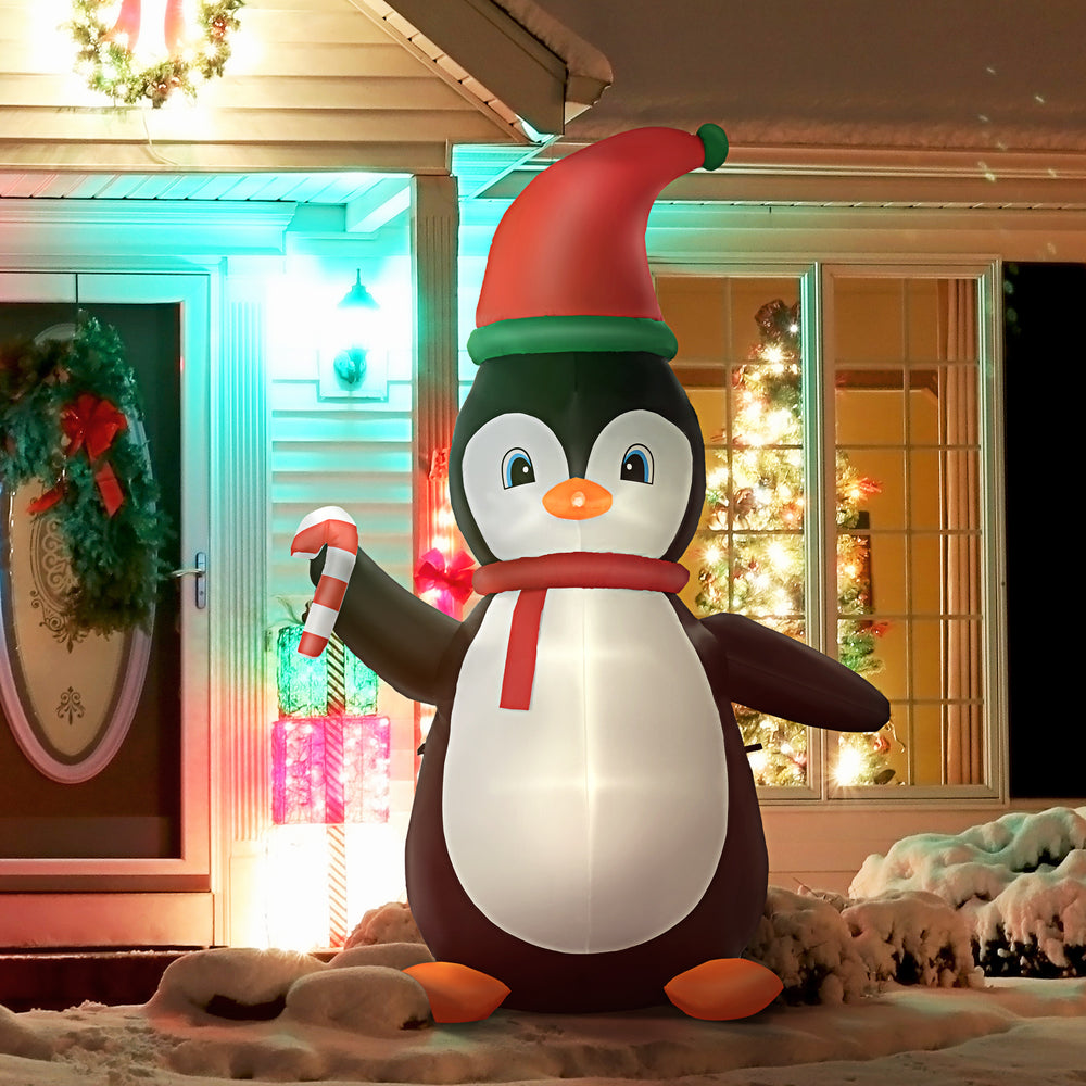Pingouin gonflable tenant une canne à sucre de 2,4 mètres