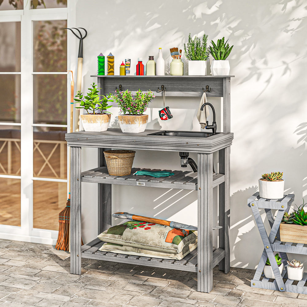 Table de rempotage d'extérieur avec robinet, évier amovible, crochets et étagères de rangement