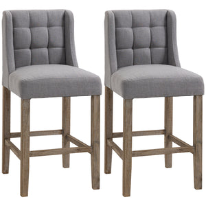 Modern upholstered and padded bar stools, grey