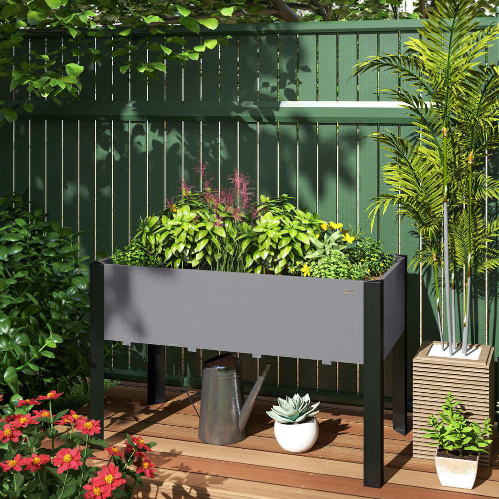Jardinière surélevée gris anthracite avec cadre en métal et panneaux en bois, idéale pour cultiver des plantes, herbes ou légumes sur une terrasse ou dans un jardin urbain