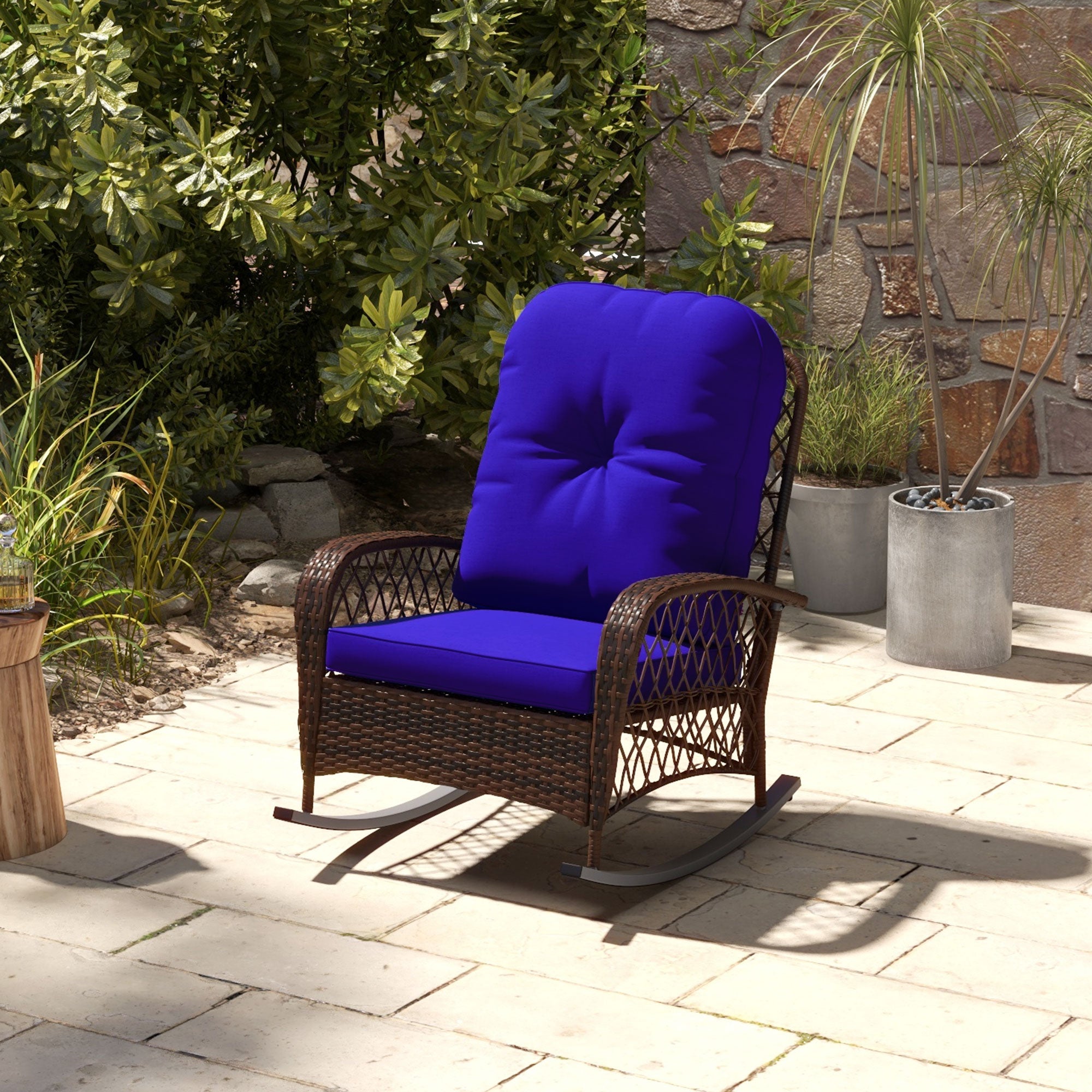 Outdoor wicker rocking chair with thick cushions, dark blue
