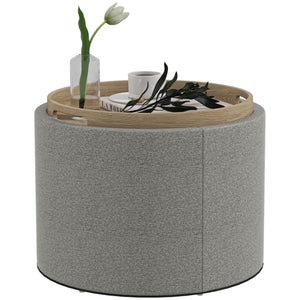 Table basse ronde avec rangement dissimulé et plateau rembourré en lin gris