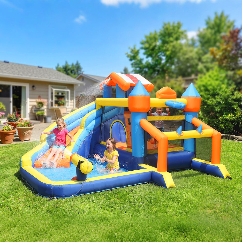 Inflatable bouncy castle for children with slide, ball pit, climbing wall and blower