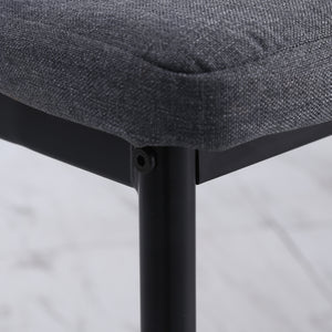 Set of 4 modern chairs upholstered in linen with tufted detailing and metal legs, grey