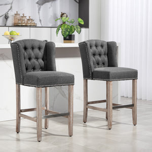 Set of 2 upholstered bar stools with studded backrest and footrest, dark grey