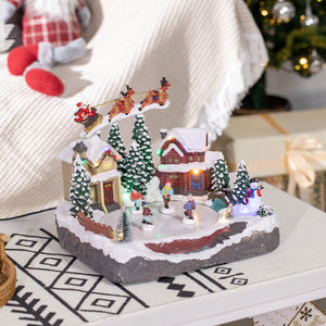 Village de Noël avec étang de patinage du Père Noël animé avec lumière LED multicolore