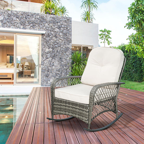 Fauteuil à bascule en rotin avec coussins épais