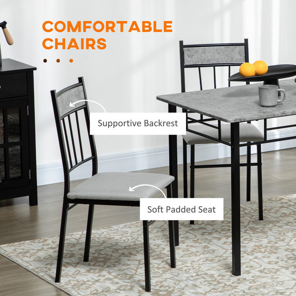 Ensemble de salle à manger 5 pièces pour 4 personnes, avec plateau effet marbre, chaises rembourrées et structure en métal gris.