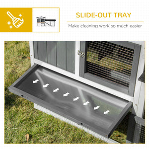 Wooden hutch with run, play tray, pull-out drawer, and ramp